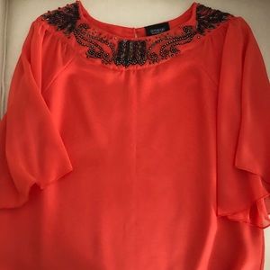 Tangerine embellished polyester blouse
